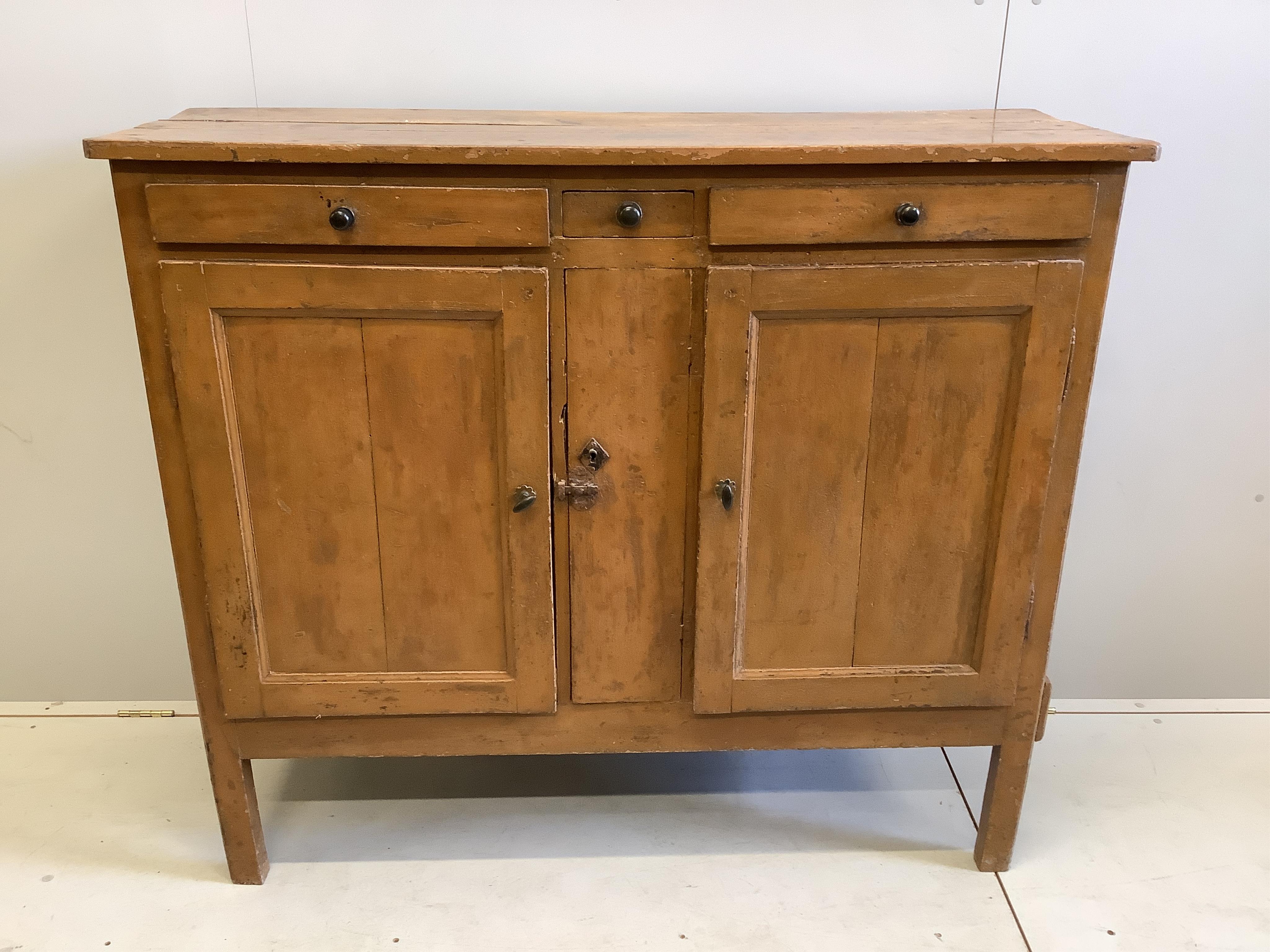 An early 19th century Continental part painted pine and fruitwood side cabinet, width 133cm, depth 48cm, height 116cm